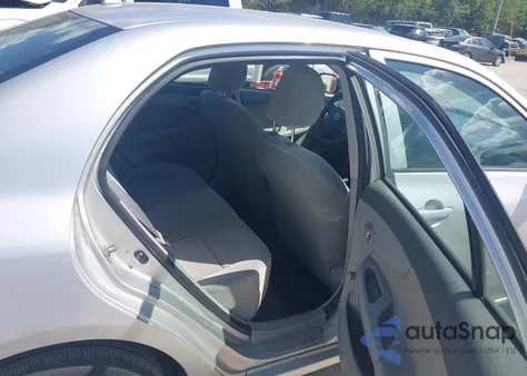 2009 Toyota Corolla from USA, damaged, VIN JTDBL40E39J036615